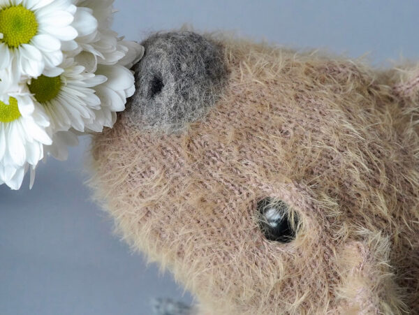 Capybara Zinaida and flowers